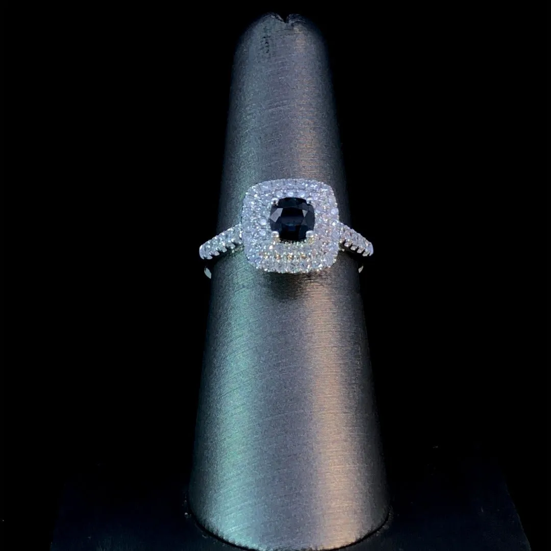 151695 - .62 ctw diamond and sapphire ring