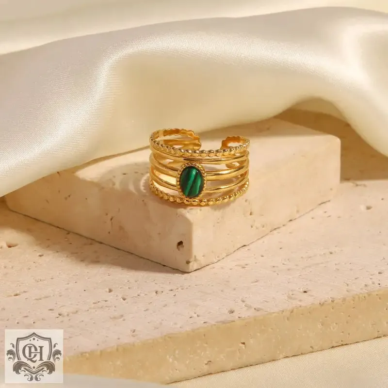 18K gold exquisite and noble gemstone inlaid ring with hollow design