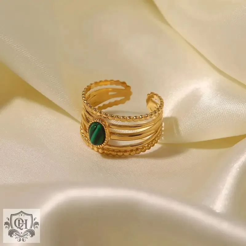 18K gold exquisite and noble gemstone inlaid ring with hollow design