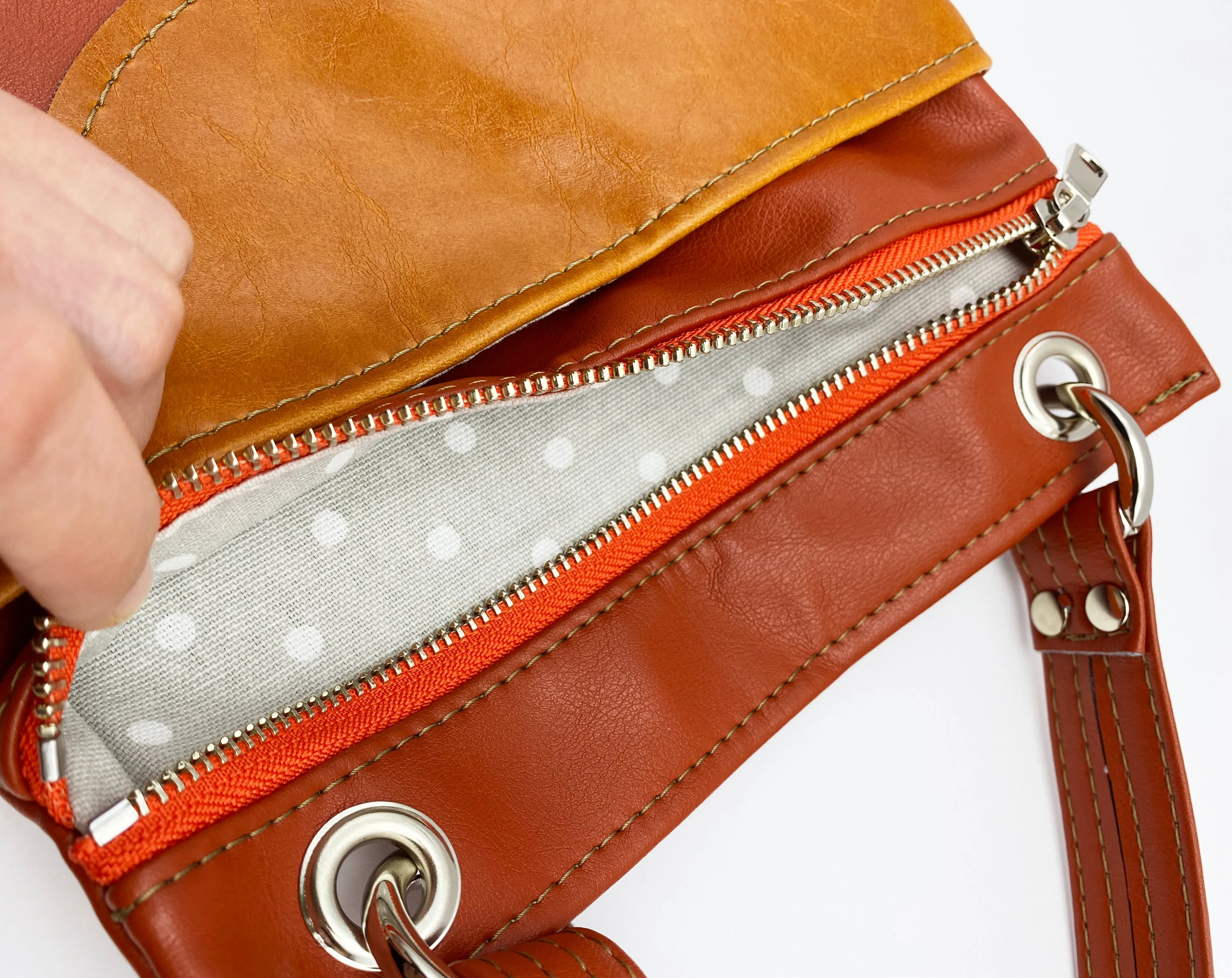 The Cloud Cross Body Travel Bag in Coral Tangerine