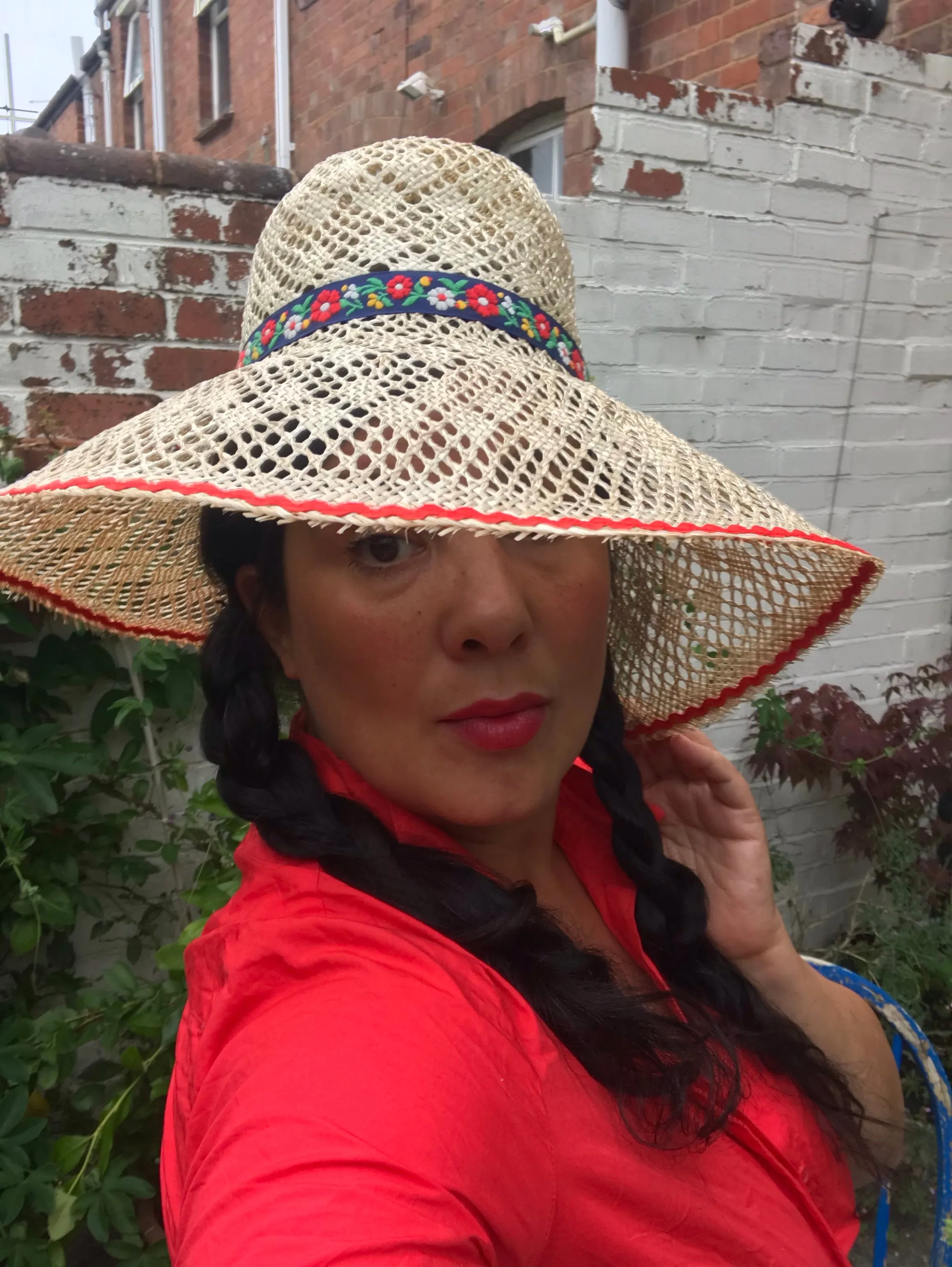 Vintage style Straw sun hat with red and floral edging