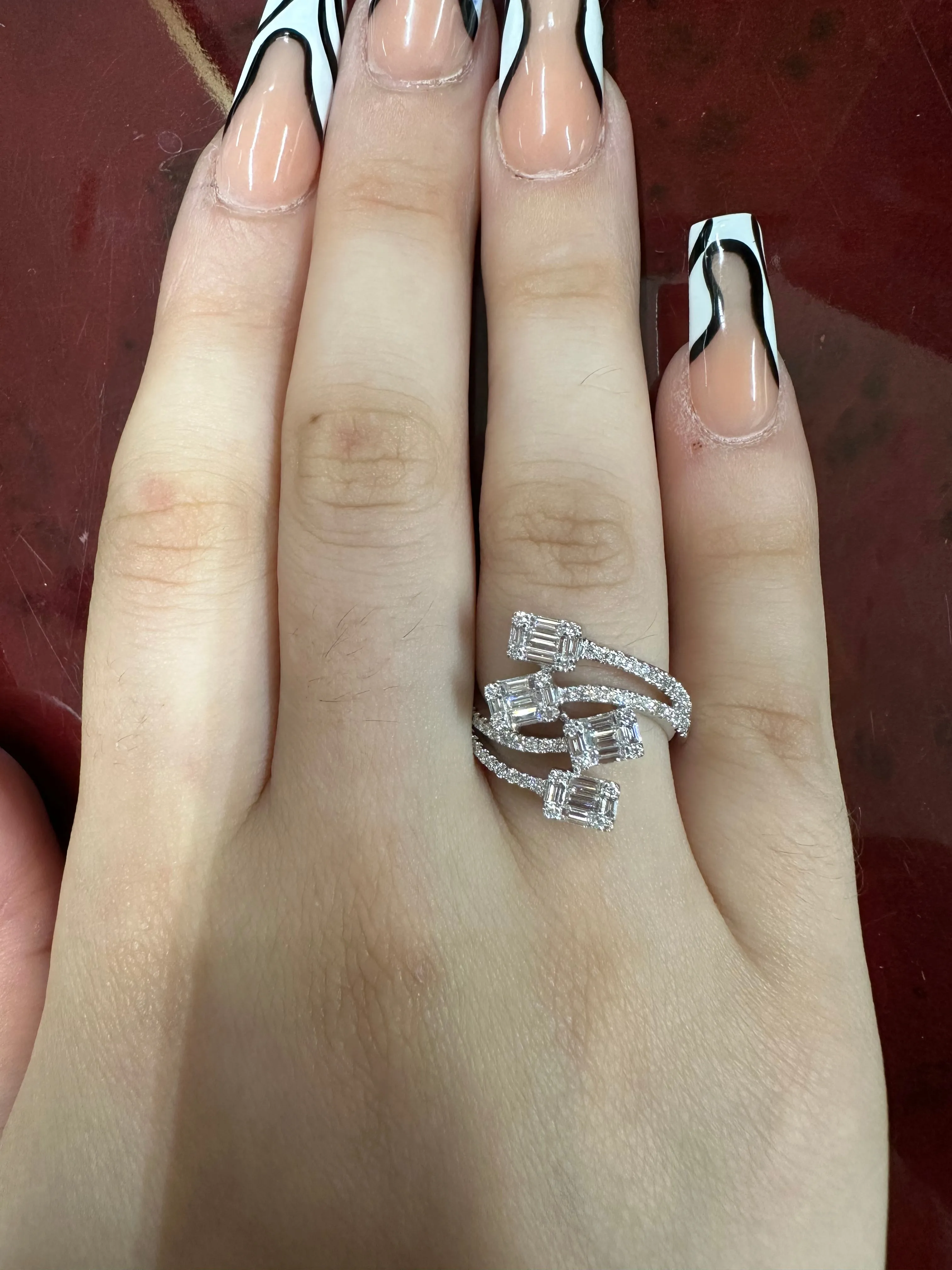 VVS/vs high clarity Diamonds set in a 18k White Gold Quadruple rectange Ladies` Diamond Ring